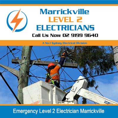 Emergency level 2 electrician working on power lines from elevated platform in Marrickville