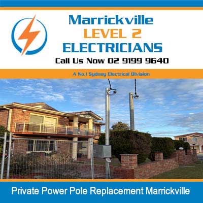New private power pole installed with electrical lines in front of residential in Marrickville