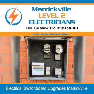 Upgraded electrical switchboard with modern meters and circuit breakers installed on brick wall in Marrickville